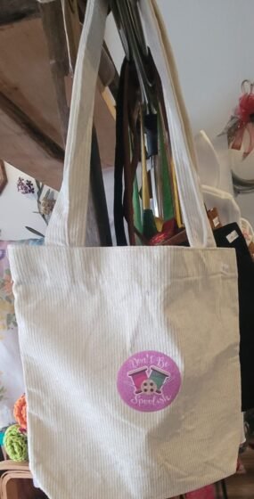 "Don't be Spoolish" corduroy tote bag